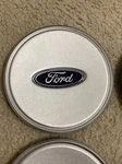 2001-2003 Ford Windstar Center Hubcap Repainted Silver 1F22-1A096-AB 1PIECE Used. Price: $25.00.