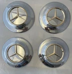 Mercedes 14" Old Style Chrome Wheel Covers New. Price: $99.95.
