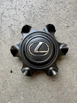 One 2017-2022 Lexus GX460 # 74297C Dark Gunmetal 18" Wheel Center Cap Used. Price: $39.99.