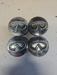Four Oem Infiniti Center Hub Cap Chrome 403435P215 403431VW5A 1/8 Set Used. Price: $28.35.