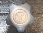 Toyota Tundra Sequoia Silver Center Cap Part # S303-10 X1834147-9SF WCA-201 Used. Price: $22.25.
