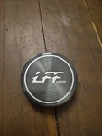 Lexani Luxx Center Cap #MCS69NL01CP Used. Price: $75.00.