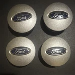 Set Of 4 Used Ford Wheel Rim Center Hub Caps. Price: $25.00.