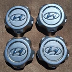 Hyundai Tucson Center Cap Set (4 Pieces) 2005-2006 Part# U03604-3800 Repainted Remanufactured. Price: $89.95.