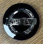 5/16" Nissan Armada, Titan Dark Charcoal Center Cap #40342-5ZM1A Single New. Price: $32.99.