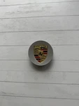 Genuine Porsche Metallic Silver Colored Crest Wheel Center Cap Made Italy New. Price: $38.00.