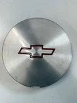 Chevy Cavalier Oem Wheel Center Cap Silver/red Logo 22540256 Used. Price: $15.00.