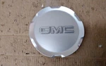 2010 Gmc Terrain Single Center Cap W/ Silver Emblem For 5449 17" Aluminum Wheel Used. Price: $25.00.