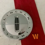 #w (1) 2003-2009 Lincoln Town Car Mkz Chrome Center Cap 4W13-1A096-CA Used. Price: $21.95.