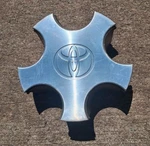 Toyota Solara Center Cap 1998-2001, Metal Clip, Part Number T0206 Used. Price: $39.95.