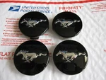 Set Of 4 Genuine Oem 2015-2025 Ford Mustang Black Center Caps P/n FR3C-1A096-AC Used. Price: $30.00.