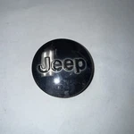 Jeep Cherokee Center Cap Wheel Hub Cover Chrome Oem 1LB77TRMAB Used. Price: $25.00.