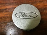 Ford Products 1991, 1992, 1993, 1994, 1995- 2002, Inch, Silver Center Cap Used. Price: $12.00.