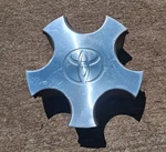 Toyota Solara Center Cap 1998-2001, Metal Clip, Part Number T0206 Used. Price: $39.95.