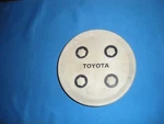 1988-1992 Toyota Corolla Center Cap #716912 (1) Gray Plastic 5/16" Diameter Used. Price: $6.00.