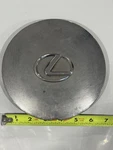 One Aftermarket 1990-1992 Lexus LS400 6.875" 15" 14 Slot Chrome Rim Center Cap Used. Price: $12.95.