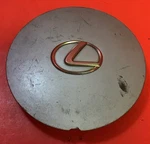 One 1990-92 Lexus LS400 15" 14 Slot Silver Wheel Center Cap 7628 /15897 Used. Price: $20.00.