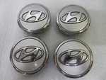 Hyundai Elantra Sonata 07-10 Silver / Chrome Button Center Caps 52960-24700 Used. Price: $49.00.