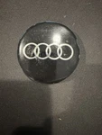 Audi Center Cap 8L-0071213666 Used. Price: $25.00.