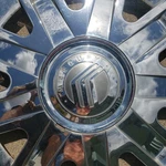 ** Mercury Grand Marquis Wheel Center 04 05 06 07 08 09 3W33-1130-BA Hubcap Used. Price: $125.00.