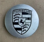 Porsche Oem Silver Center Cap. #7L5601149A 3" Diameter. Used. Price: $27.95.