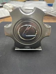 2005-2009 Lexus GX470 Hyper Silver Center Cap 42603-60640 Remanufactured. Price: $75.00.
