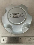 98-07 Ford Ranger Explorer Crown Vic Silver Center Hubcap Oe 7L54-1A096-AA Used. Price: $19.75.