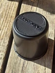 2- Ez Lube Black Center Cap 3.19" And 10 1/2 20 Lug Nuts -( Not Pictured) New. Price: $49.00.