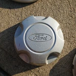 Grey Ford Explorer Ranger Wheel Center 1998 2011 7L54-1A096-AA Hubcap Used. Price: $11.25.