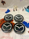 Set Of 4 Mazda Black Center Wheel Caps Chrome Emblem 56MM Hub Logo Remanufactured. Price: $19.98.