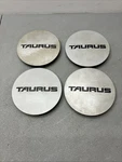 F2DC-1141- Aa Silver Wheel Center Caps 92-95 Ford Taurus Set Of Used. Price: $39.99.
