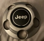 Jeep Center Cap 52057618 52057619 85501-D 5CF35-TRM 5CF34-TRM Used. Price: $30.00.