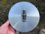 Lincoln Continental Oem Wheel Center Cap Machined Alloy 1988-1997 E80C-1A096-AA Used. Price: $9.95.