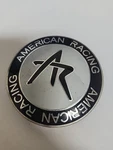 American Racing Blk/white Custom Center Cap* #1242100S/ F112-26 (for ) Used. Price: $5.00.