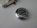 Cadillac Metallic Chome Oem Wheel Center Cap # 99-2210 Used. Price: $77.99.