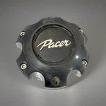 89-9765BKH Pacer Gloss Black Bolt-on Center Cap For 6X135/6X5.5 Pattern Used. Price: $25.00.