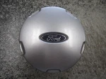 One (1) Oem 2001-2004 15" Ford Escape Silver Center YL84-1A096-DB 3427 Used. Price: $25.00.