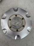 1998-2005 Oldsmobile Bravada Center Wheel Cap Used Oem 9593401, 9594015. Price: $15.00.