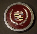 1 Cadillac Seville 255695..2 Oem Wheel Center Caps Hub Cover Wreath. Used. Price: $33.34.