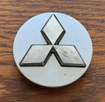 Oem Mitsubishi Diamante Raider Silver Wheel Center Hub Cap 52014443AA 1BY37TRMAA Used. Price: $14.97.