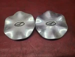 1999-2004 Oldsmobile Alero Center Hubcaps 9592627 Pair Used. Price: $10.00.