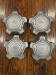 Ford Maverick 2021-2025 Silver Center Caps Set Of 4 NZ6C-1000-A1A Oem New. Price: $99.95.