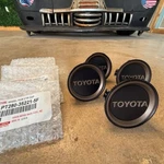 (4) Genuine Toyota 84MM Bronze Black PT280-25221-5F New. Price: $139.95.