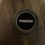 1992 Mazda B2000 B2200 Center Hubcap Pickup F27A-1A097-BA Used. Price: $40.00.